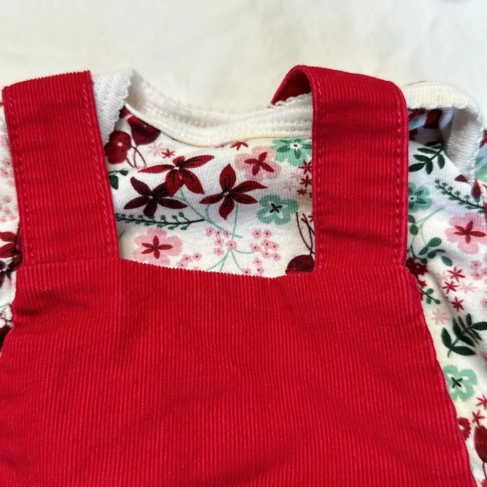 Carter’s baby girl Christmas bundle. One pair of fleece footed pajamas, one tutu
